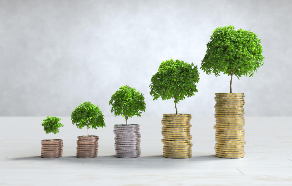 A series of coins with trees growing on them.